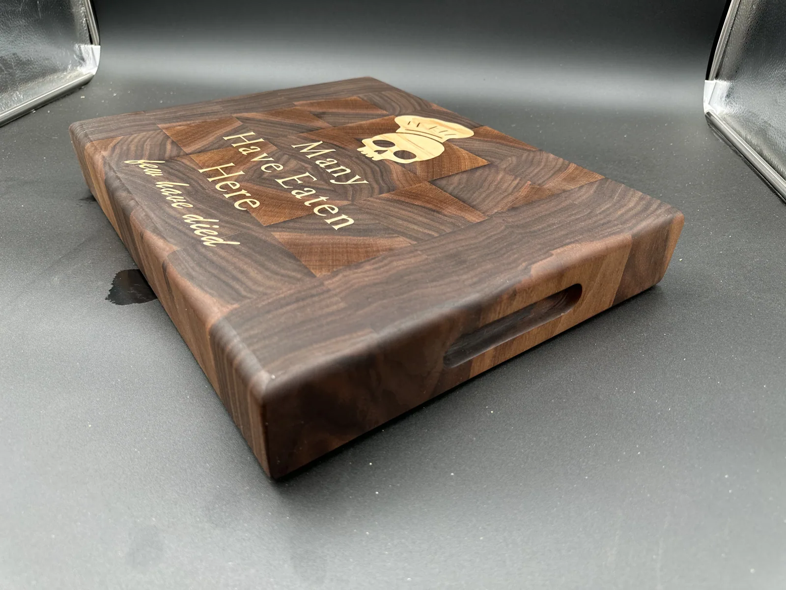 Angled view showing the inlay side and the end-grain edge