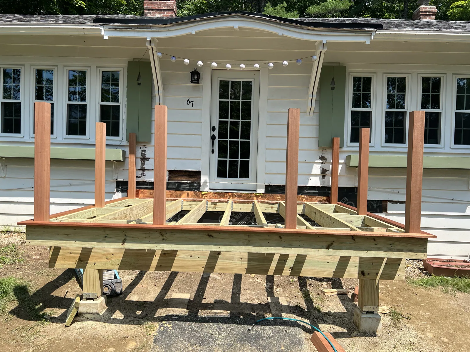 Picture-frame framing with railing posts blocked in