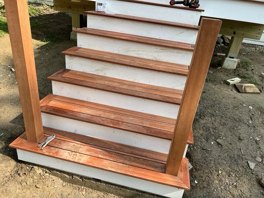 Finished mahogany stairs with railing
