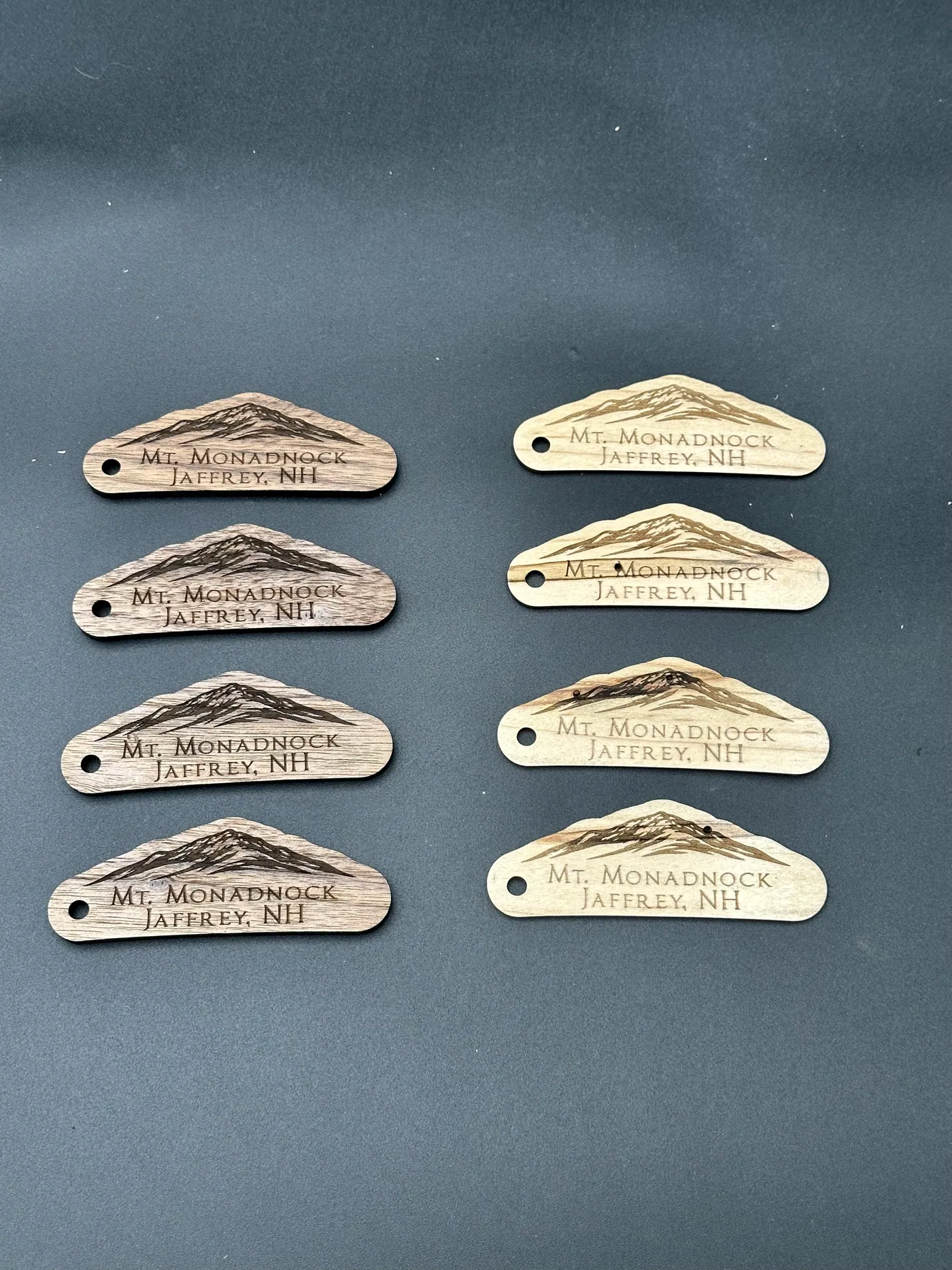 Small wooden keychains engraved with the Mt. Monadnock ridgeline and Jaffrey, NH.