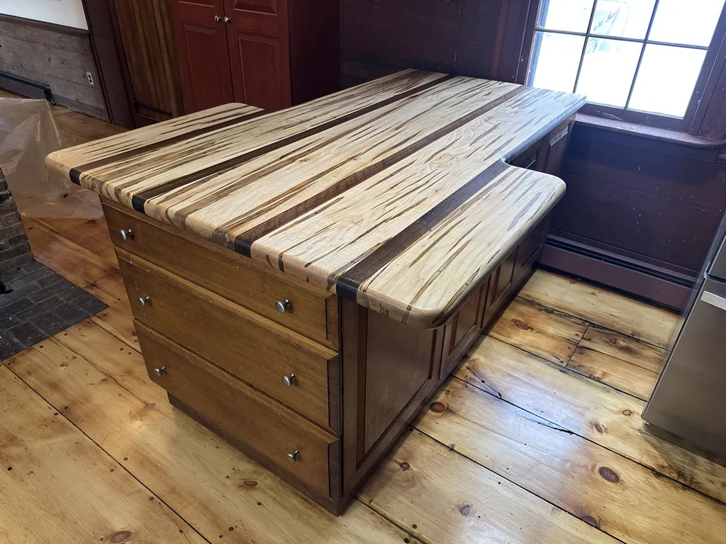 Ambrosia maple kitchen island with a figured top