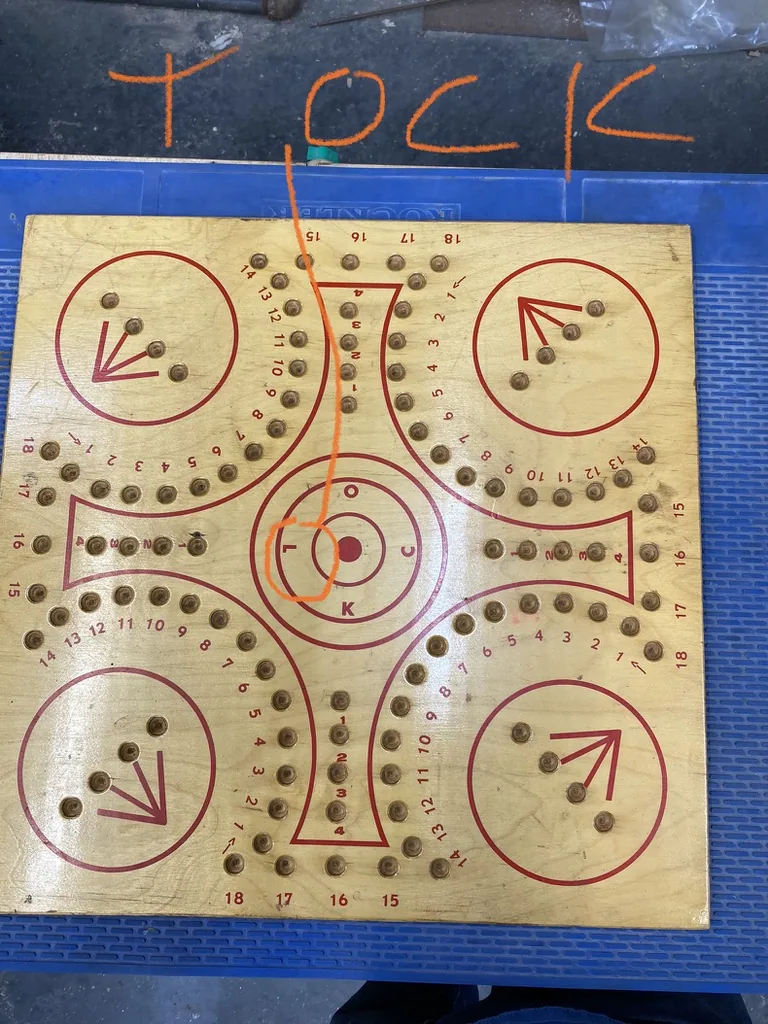 The customer's original plywood Tock board used as reference