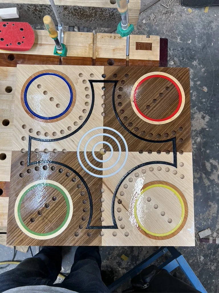 All four corners carved with tracks and the center cut in