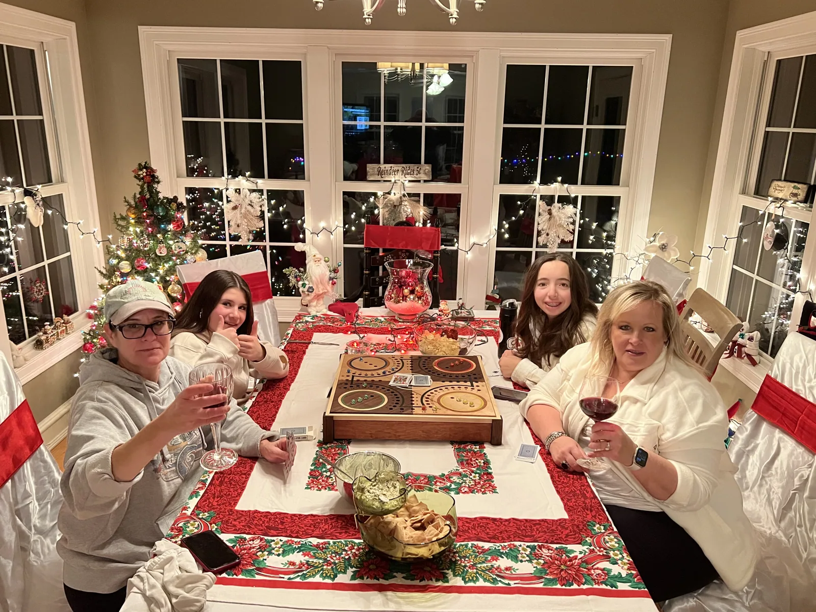 The customer's family around their table at Christmas playing on the finished board