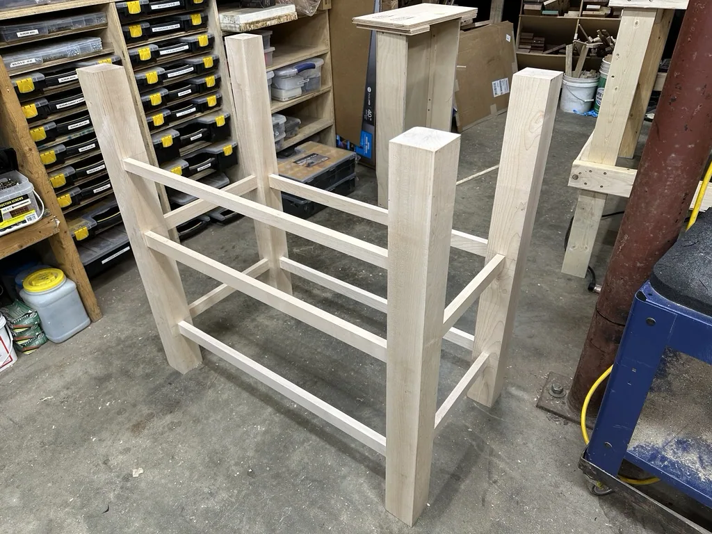 Frame pieces and legs joined with mortise-and-tenon joinery