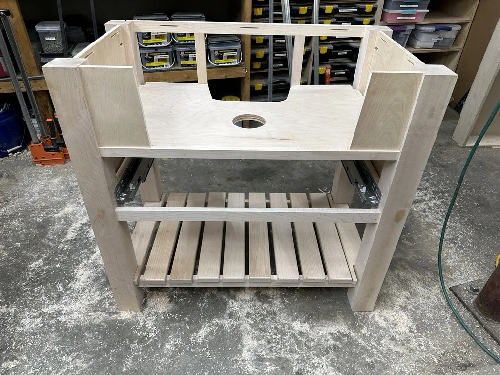 Vanity cabinet assembled with the sink opening and lower shelf